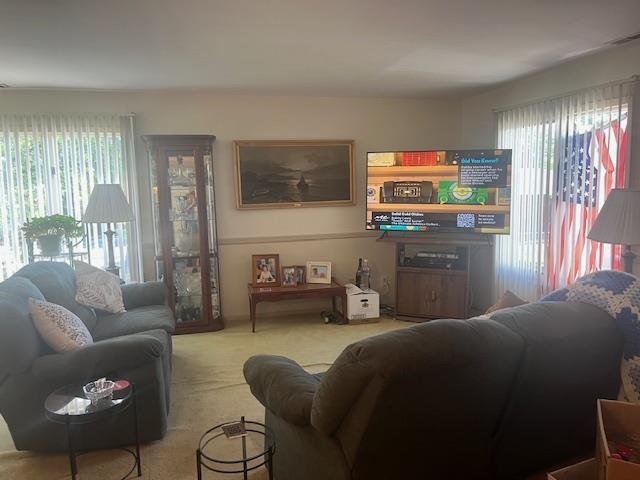 700 10th Street, Unit 12 Secaucus, NJ 07094 - Photo 2 of 13 a bedroom with furniture and a window