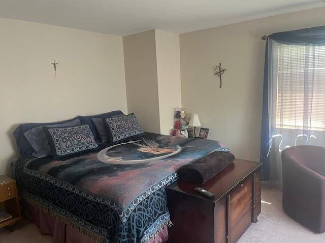 700 10th Street, Unit 12 Secaucus, NJ 07094 - Photo 4 of 13 a living room with furniture and a window
