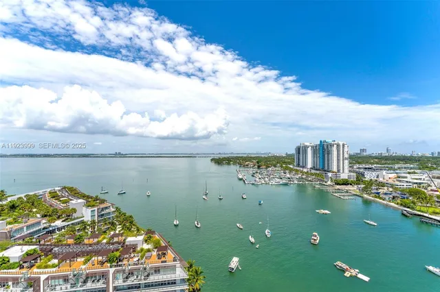 a view of a lake with a city