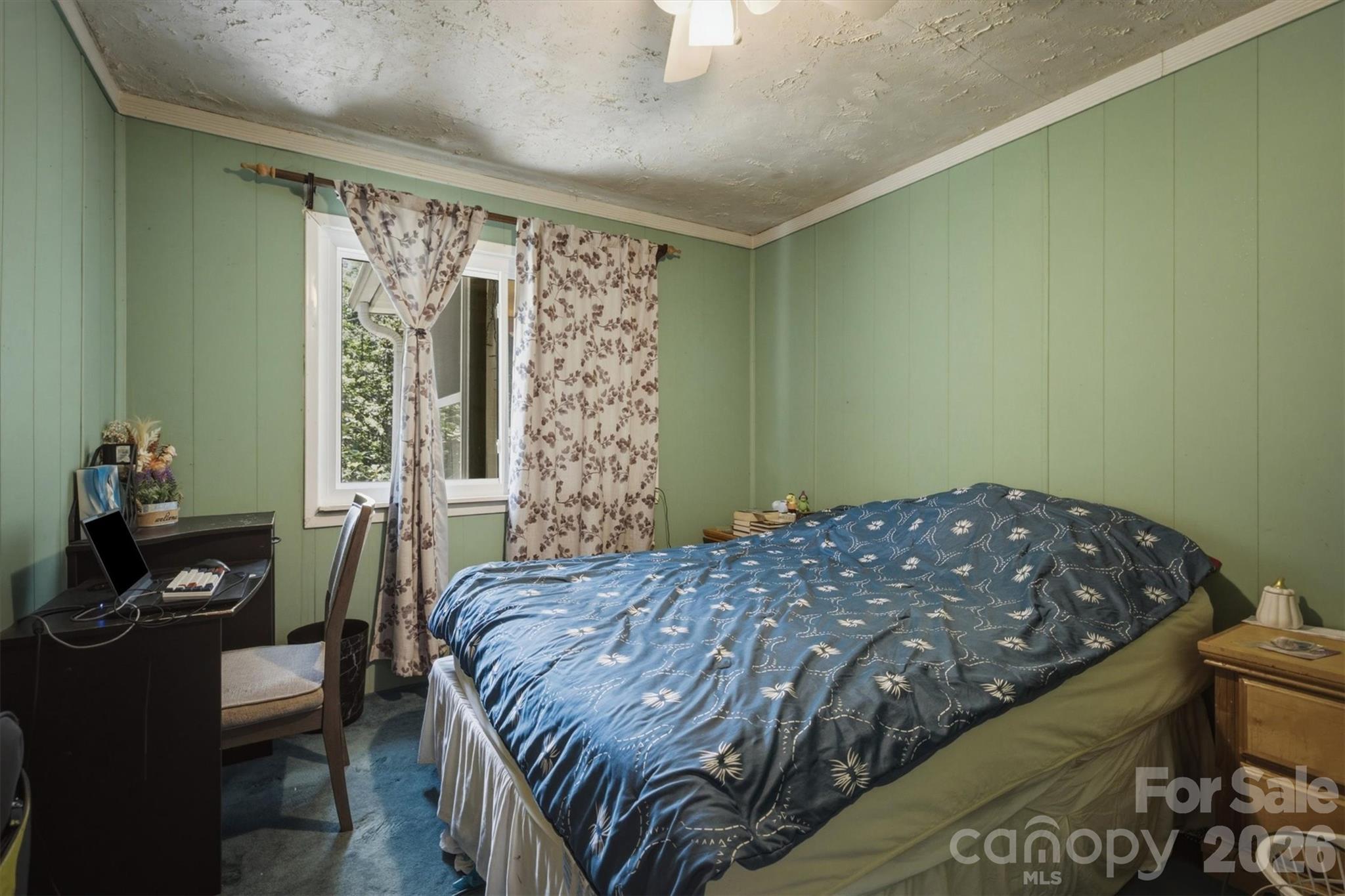 3153 Faith Temple Church Road Morganton, NC 28655 - Photo 12 of 24 a bedroom with a bed and a window