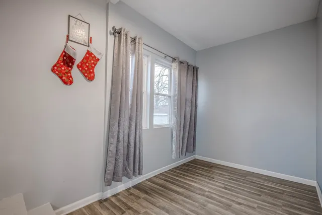 a view of an empty room and window