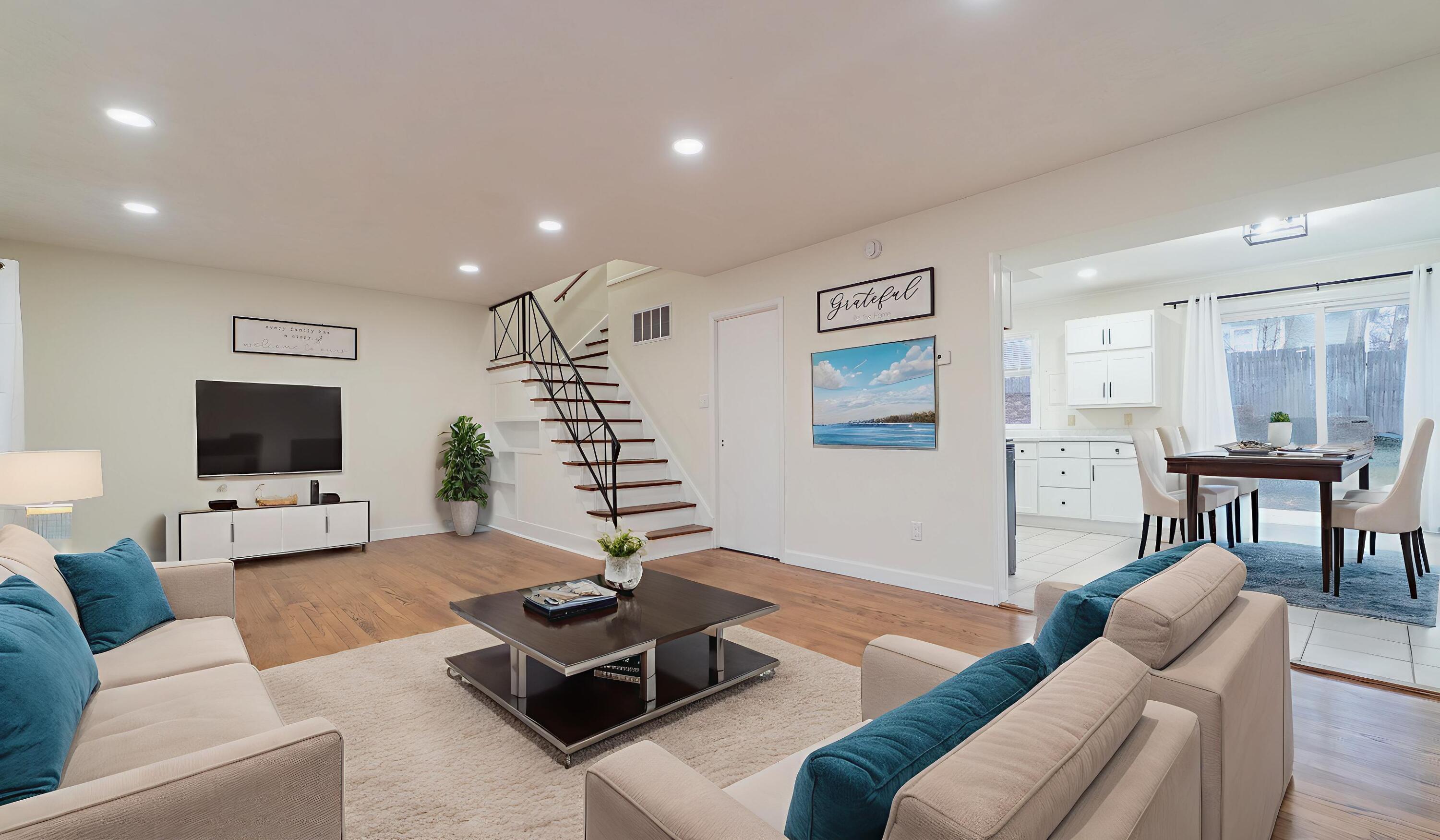 722 Madison Street Michigan City, IN 46360 - Photo 2 of 43 a living room with furniture and a flat screen tv