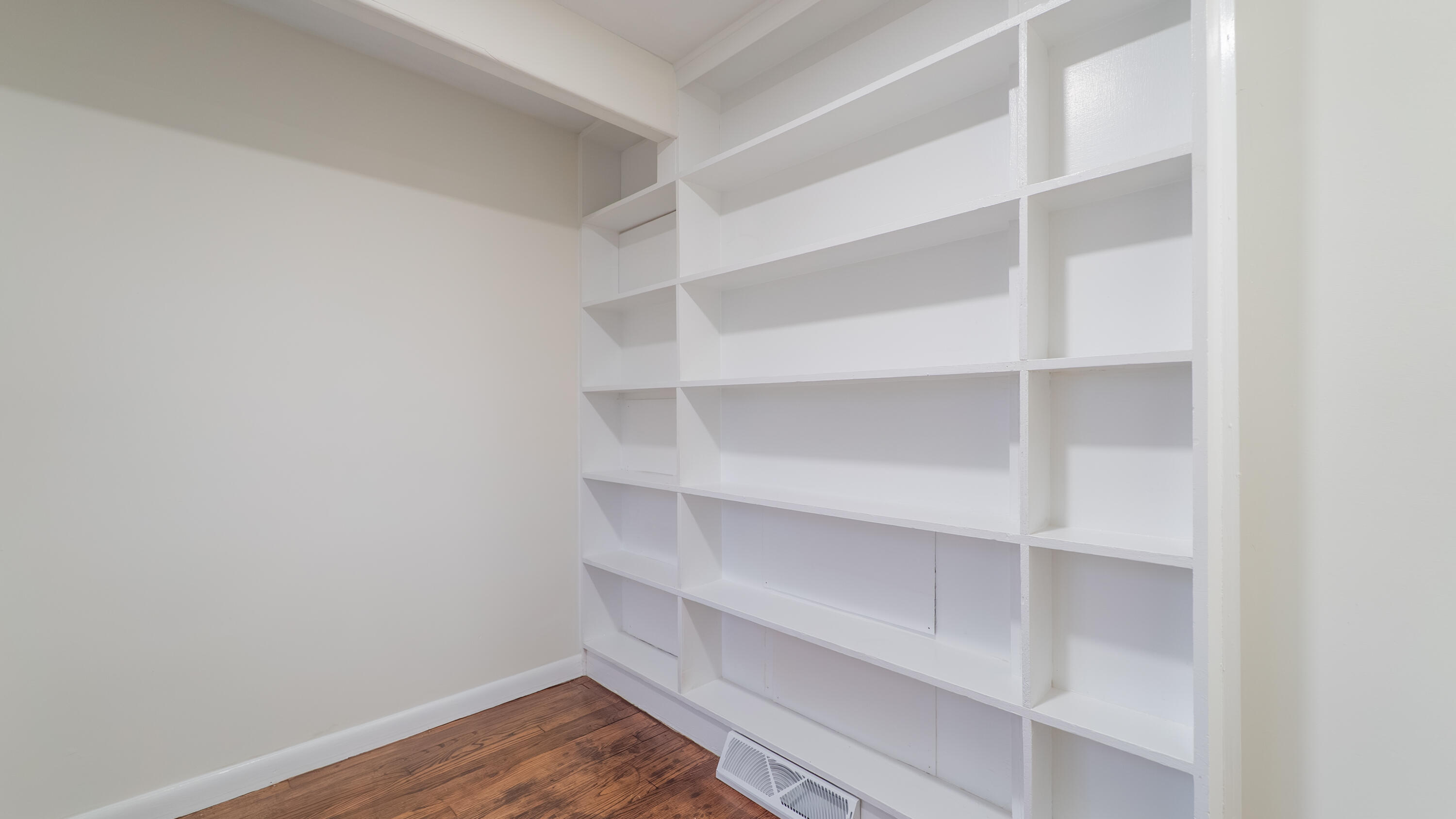 722 Madison Street Michigan City, IN 46360 - Photo 26 of 43 a view of walk in closet with empty racks