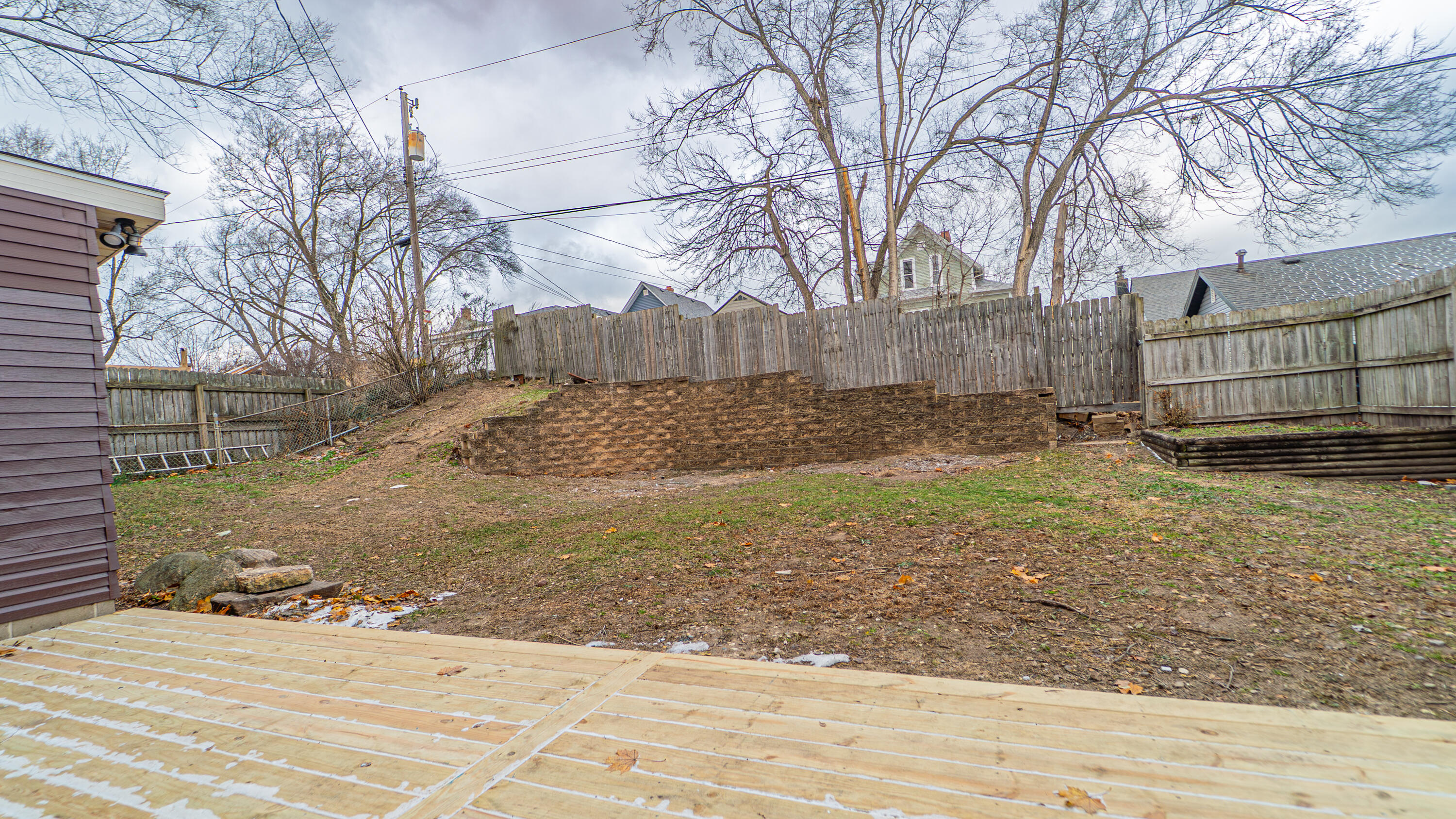 722 Madison Street Michigan City, IN 46360 - Photo 38 of 43 a view of a backyard of the house