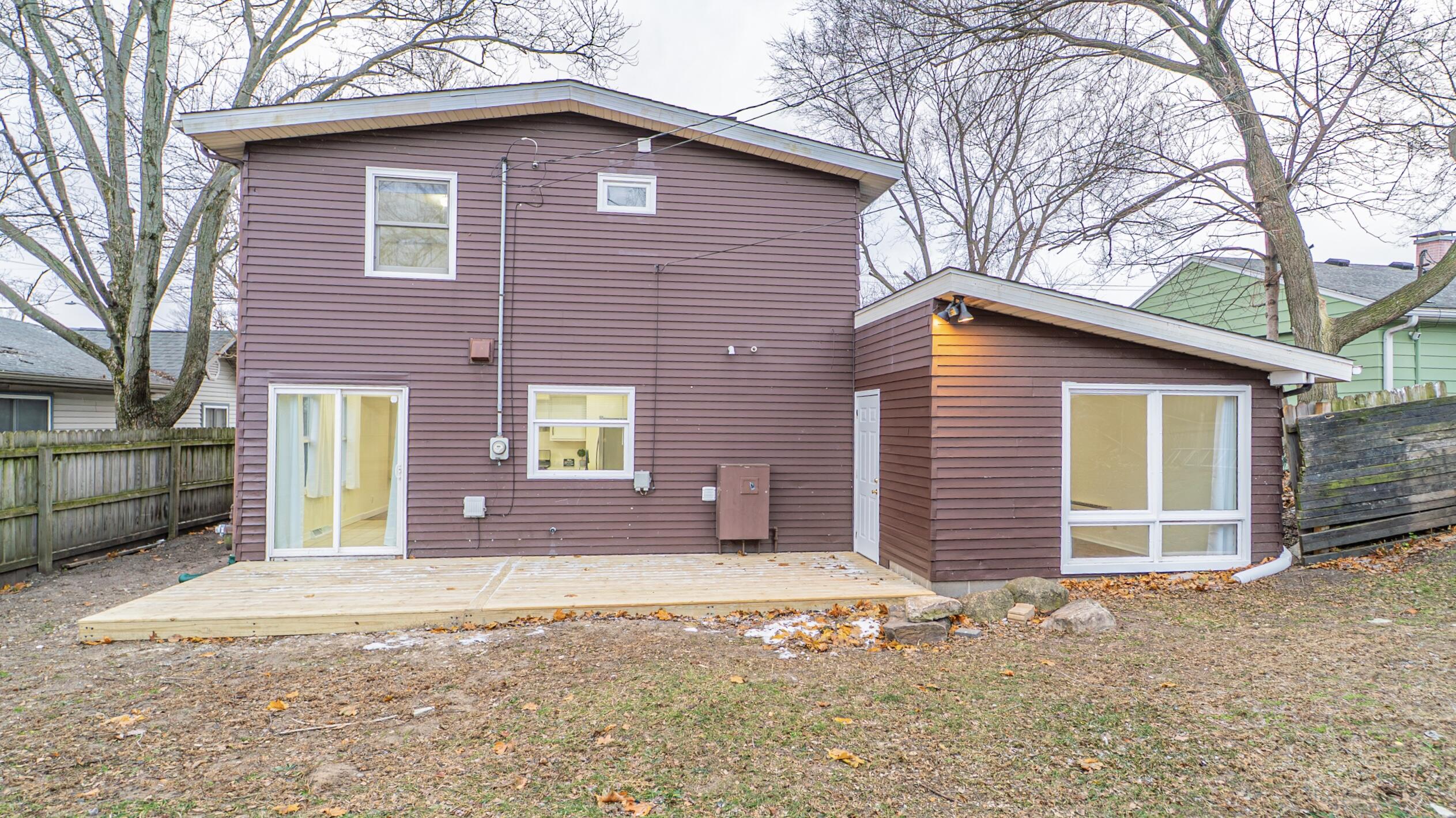 722 Madison Street Michigan City, IN 46360 - Photo 41 of 43 a front view of a house with garden