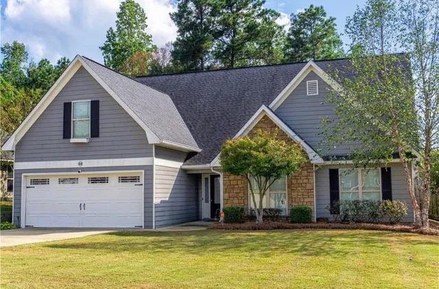 a view of a house with a swimming pool