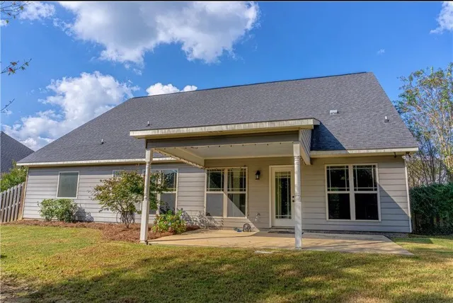 a house view with a swimming pool
