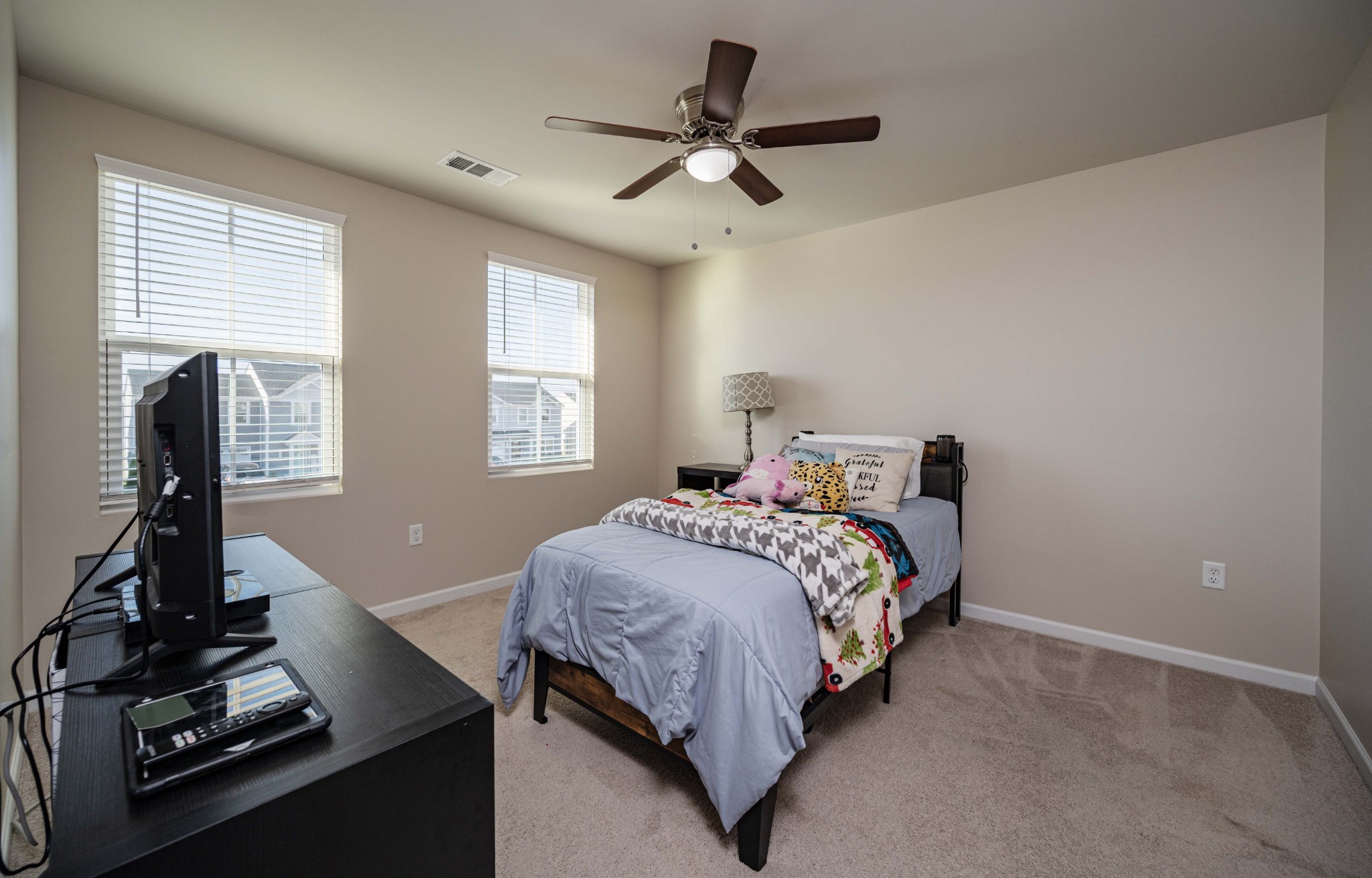5531 Compass Way Christiana, TN 37037 - Photo 13 of 21 a bedroom with a bed and a window