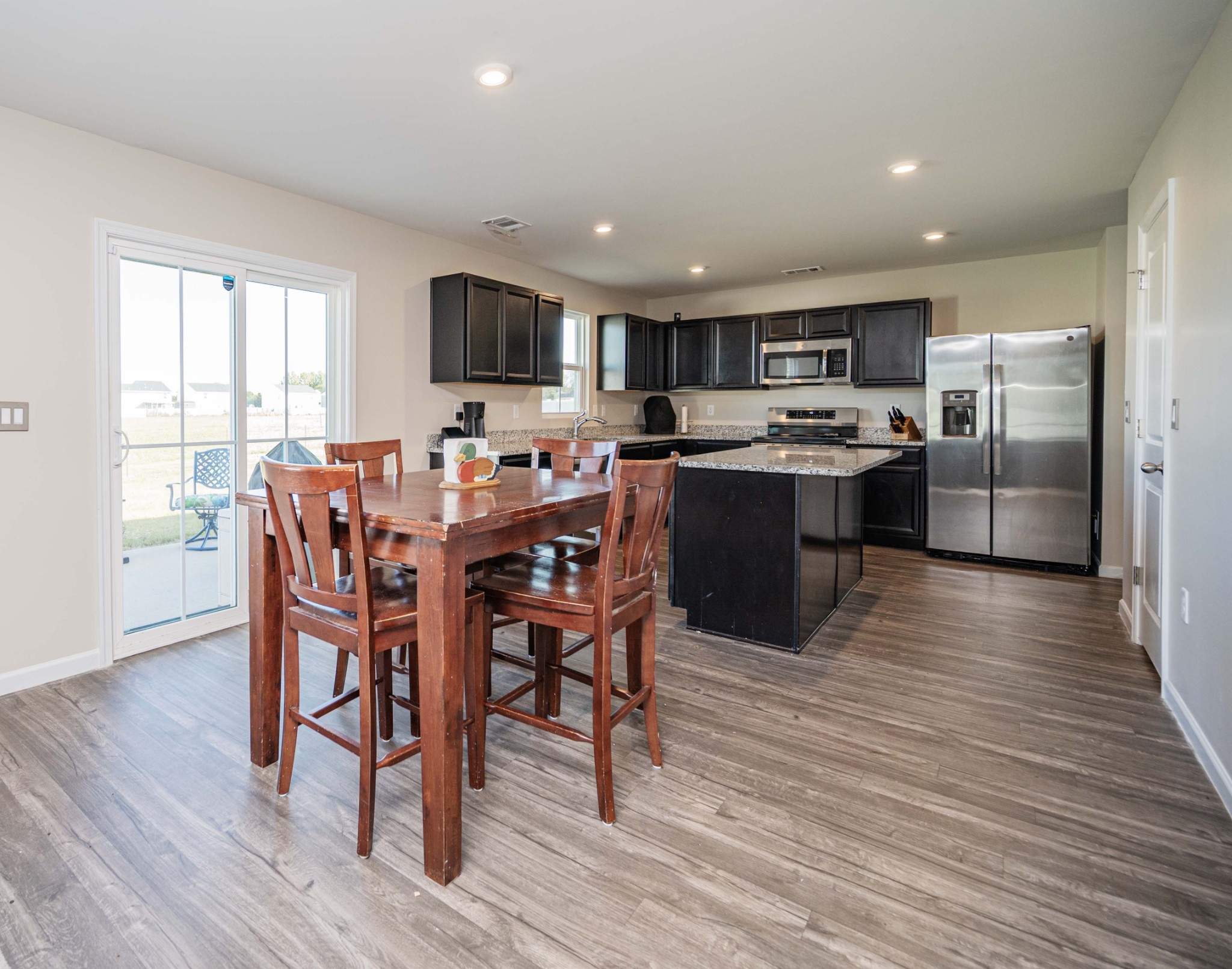 5531 Compass Way Christiana, TN 37037 - Photo 4 of 21 a view of a dining room with furniture window and wooden floor