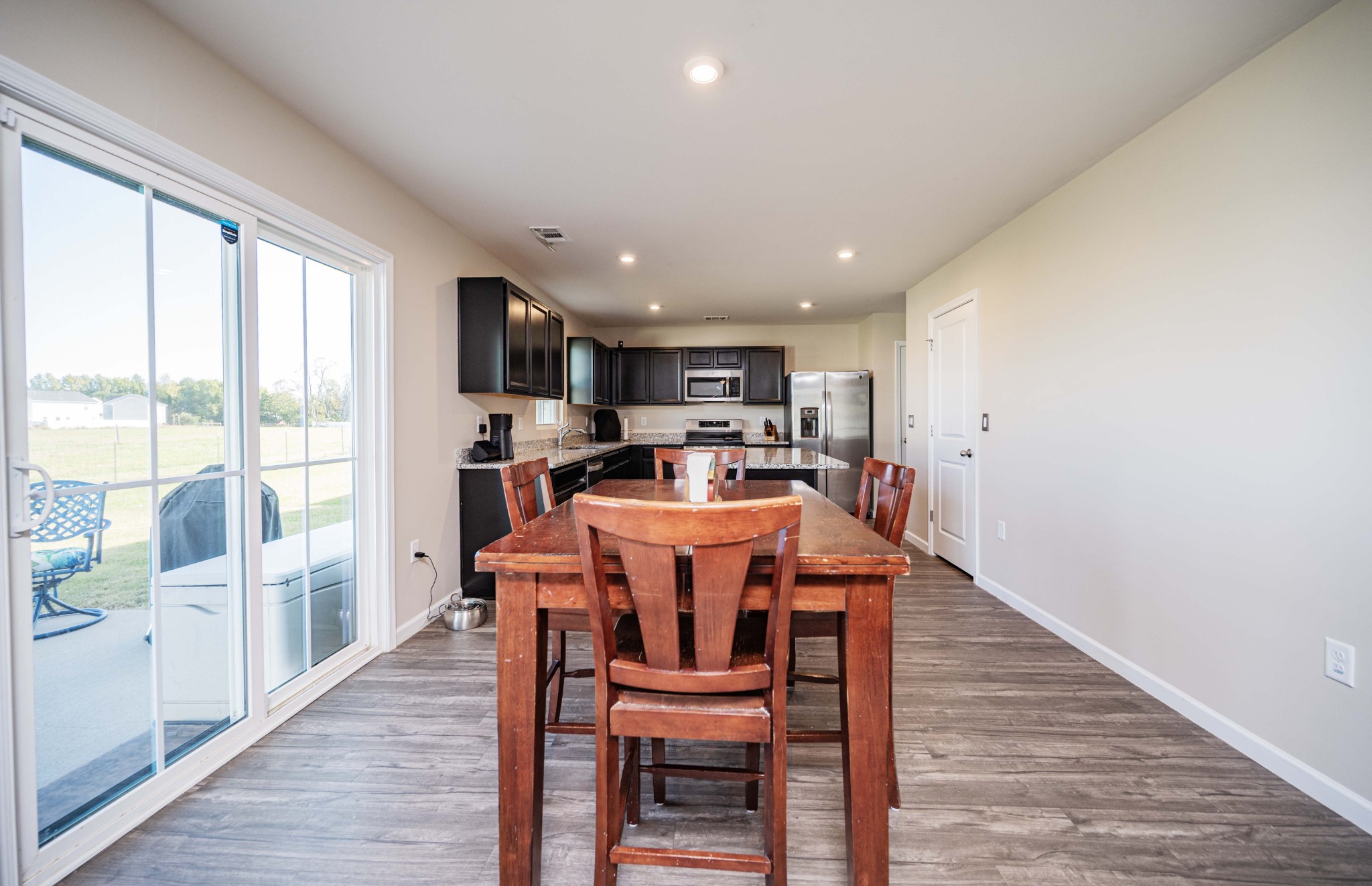 5531 Compass Way Christiana, TN 37037 - Photo 5 of 21 a dining room with furniture and wooden floor