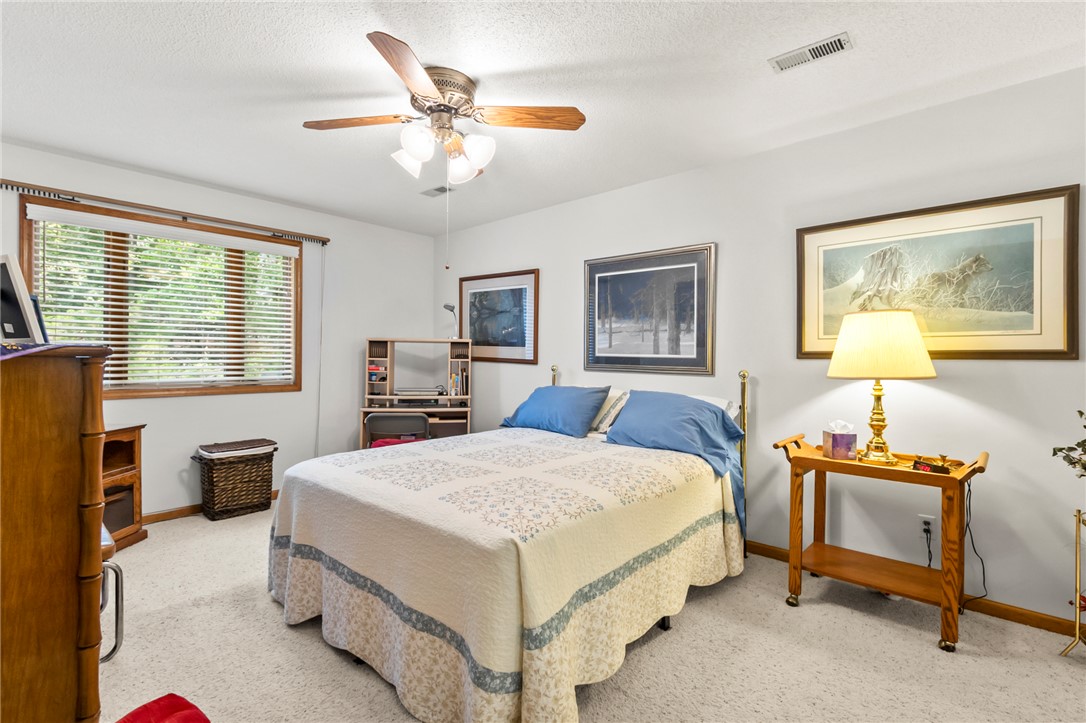 202 Plantation Point Anderson, SC 29625 - Photo 19 of 48 A quiet retreat, this bedroom offers comfort and natural light.