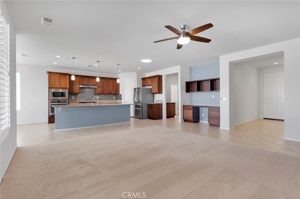 18968 Raven Street Apple Valley, CA 92308 - Photo 13 of 53 a view of a kitchen with a sink and cabinet