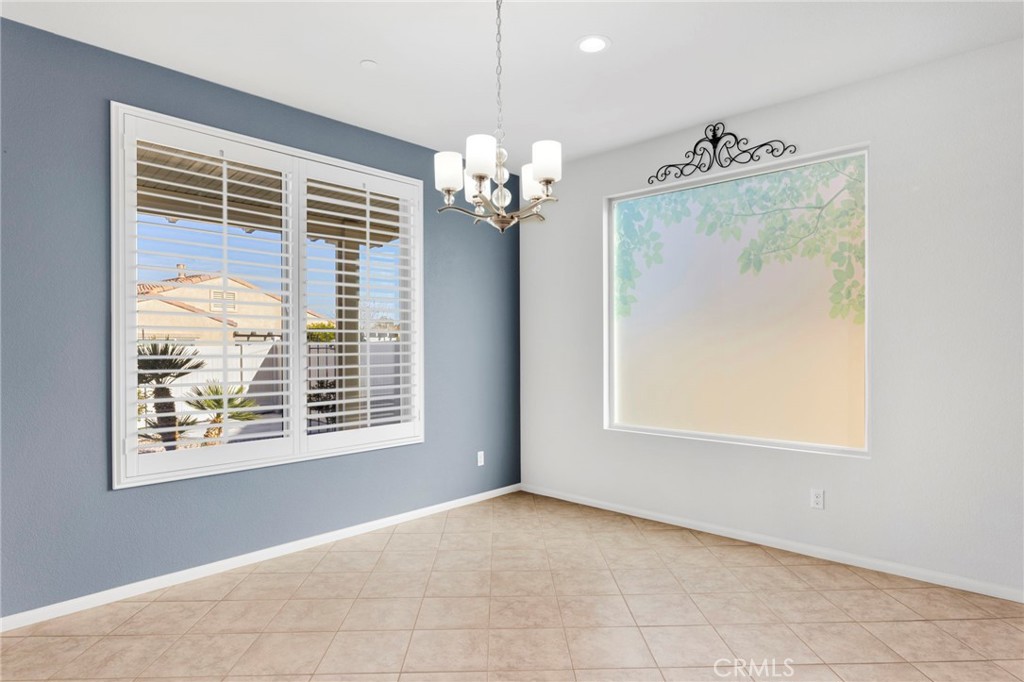 18968 Raven Street Apple Valley, CA 92308 - Photo 21 of 53 a view of an empty room with a window