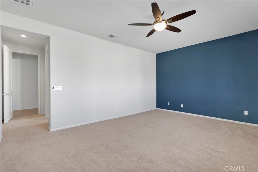 18968 Raven Street Apple Valley, CA 92308 - Photo 26 of 53 an empty room with closet and fan