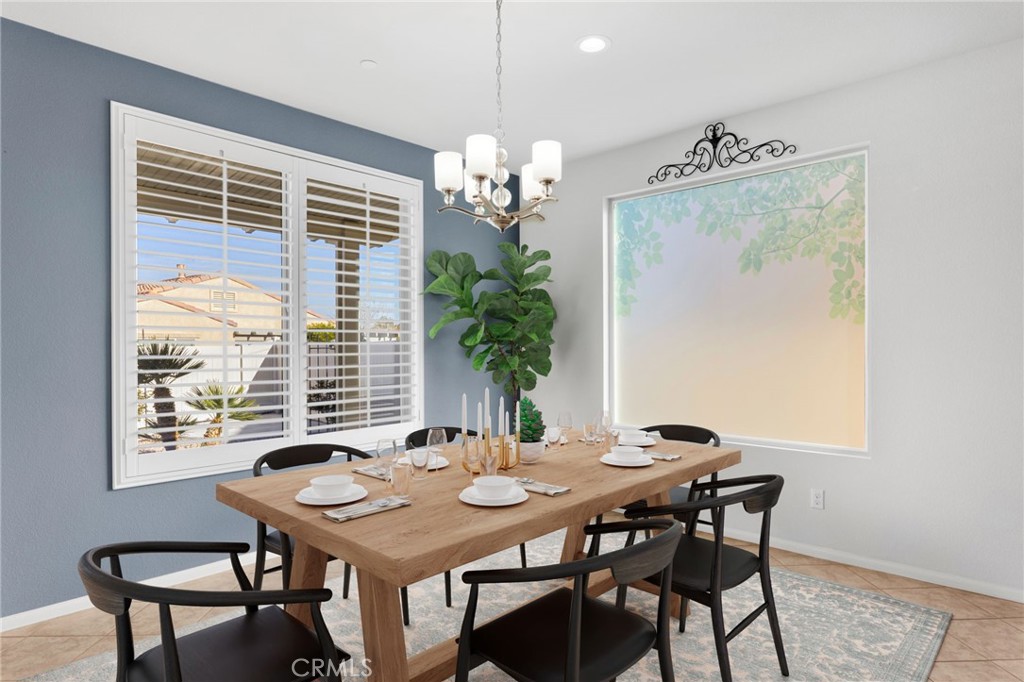 18968 Raven Street Apple Valley, CA 92308 - Photo 6 of 53 a view of a dining room with furniture window and outside view