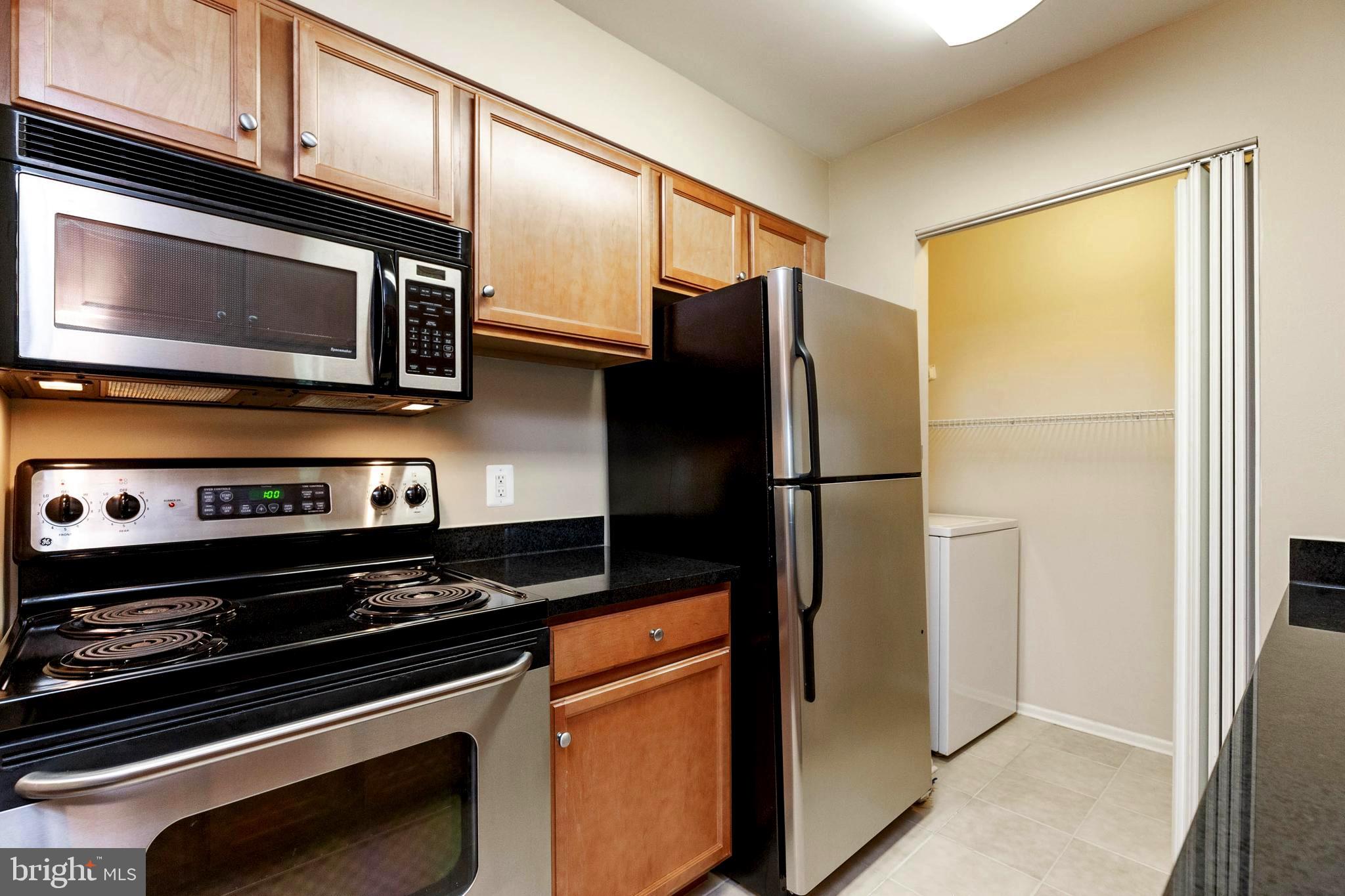 1793 Jonathan Way, Unit L Reston, VA 20190 - Photo 13 of 33 Full sized Washer and Dryer in unit