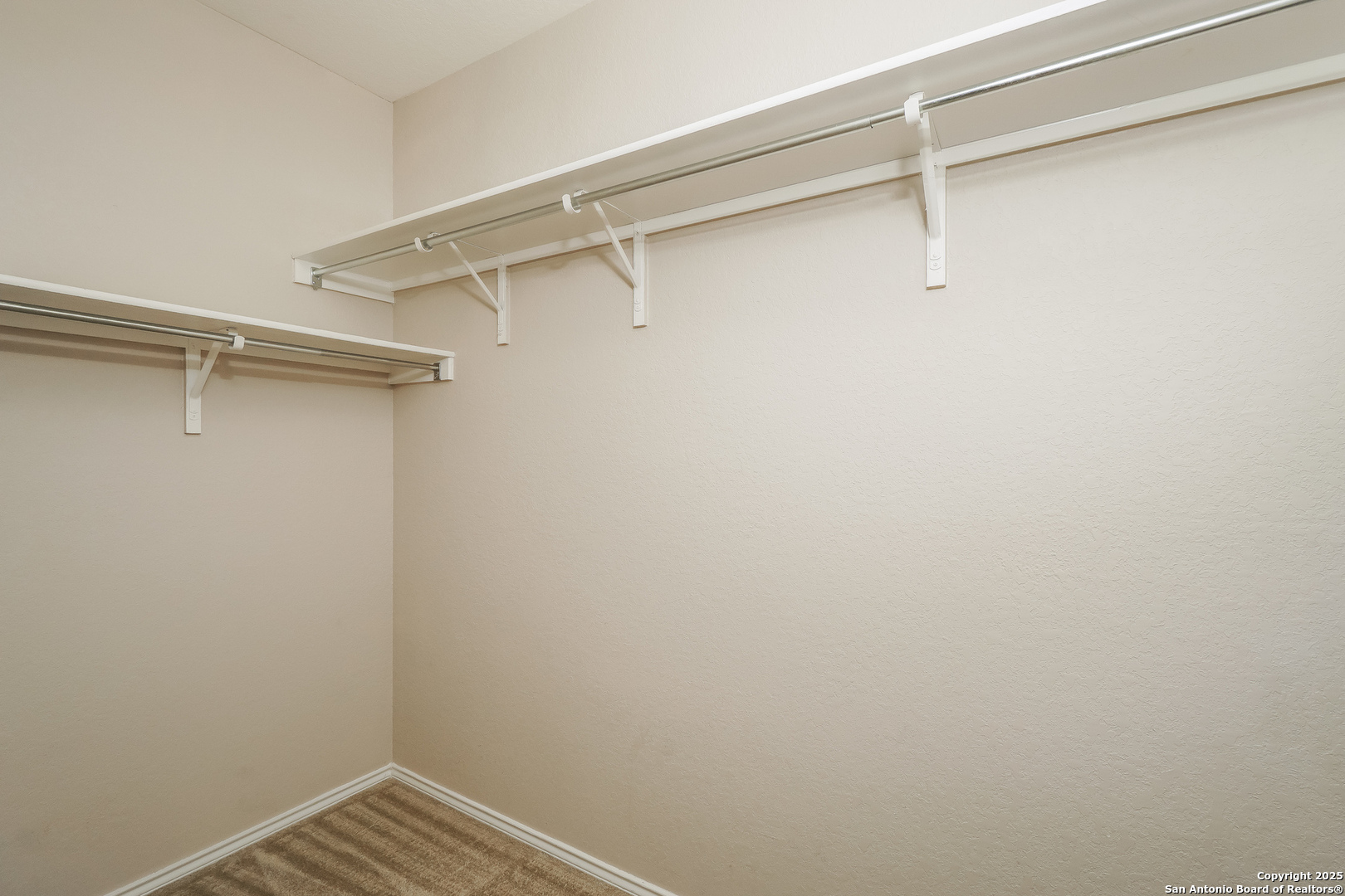 540 Landmark Gate Cibolo, TX 78108 - Photo 11 of 22 a view of an empty walk in closet