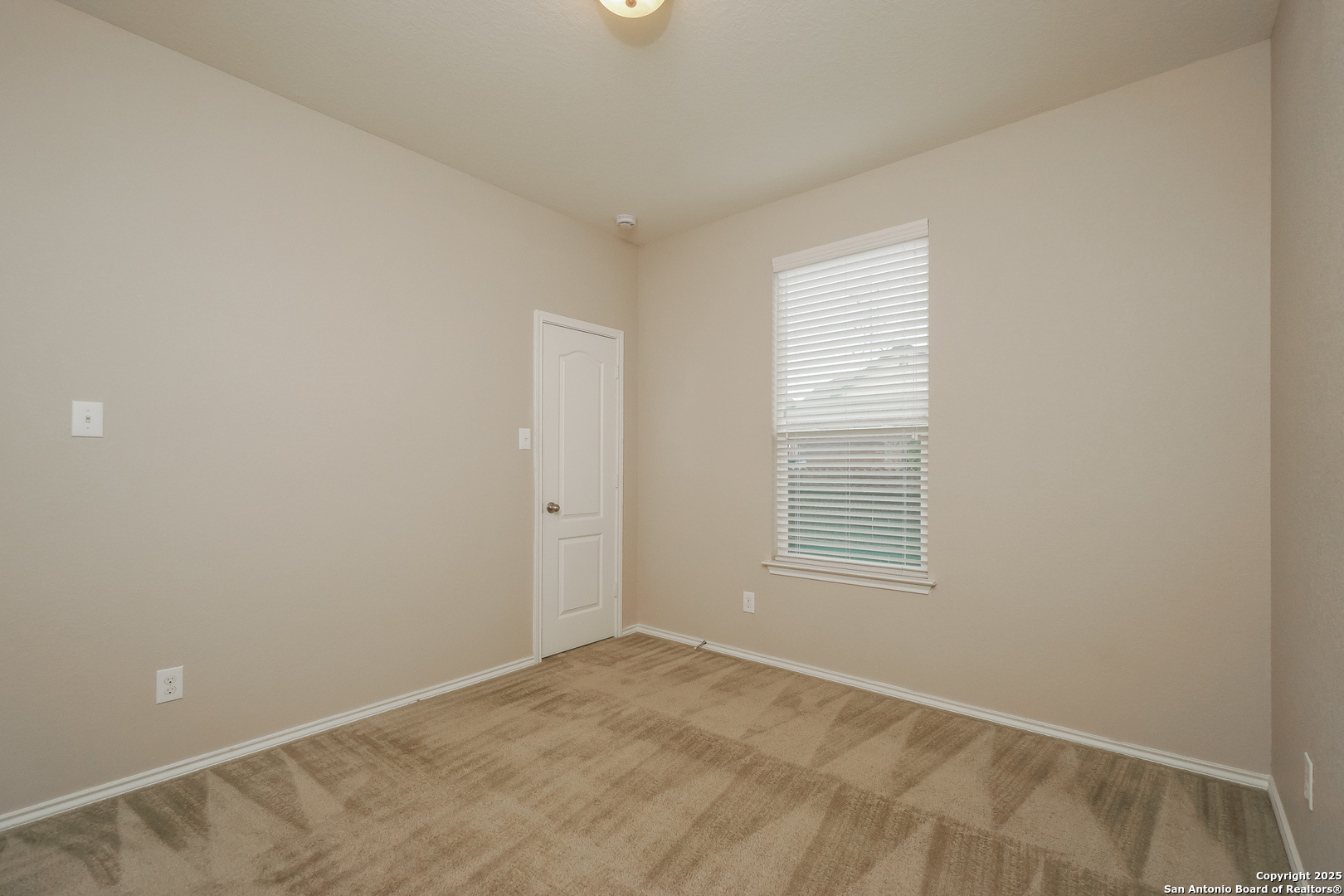 540 Landmark Gate Cibolo, TX 78108 - Photo 12 of 22 a view of an empty room with a window