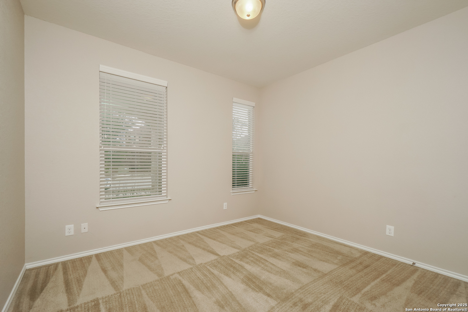 540 Landmark Gate Cibolo, TX 78108 - Photo 13 of 22 an empty room with a window