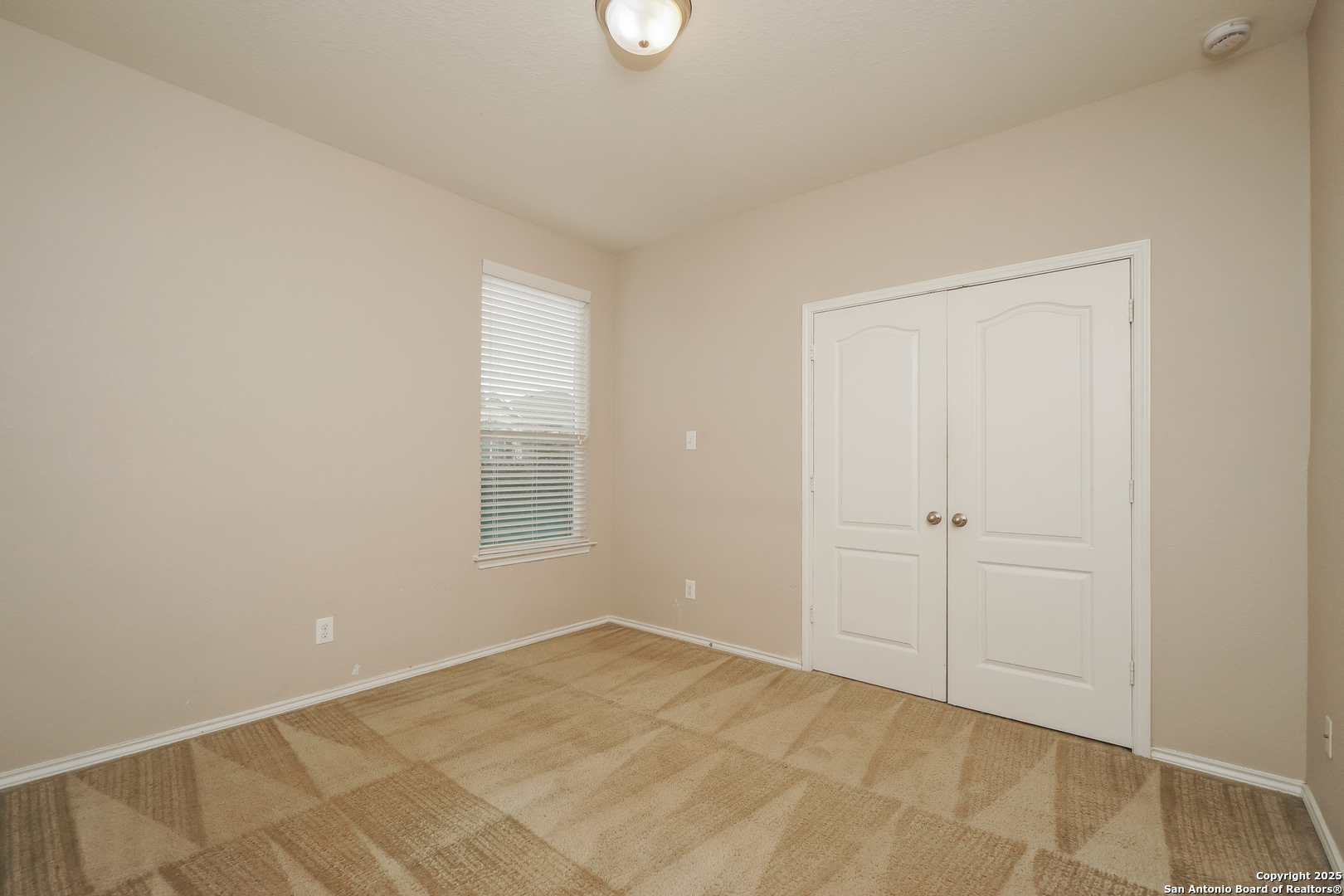 540 Landmark Gate Cibolo, TX 78108 - Photo 14 of 22 a view of an empty room with window and closet area