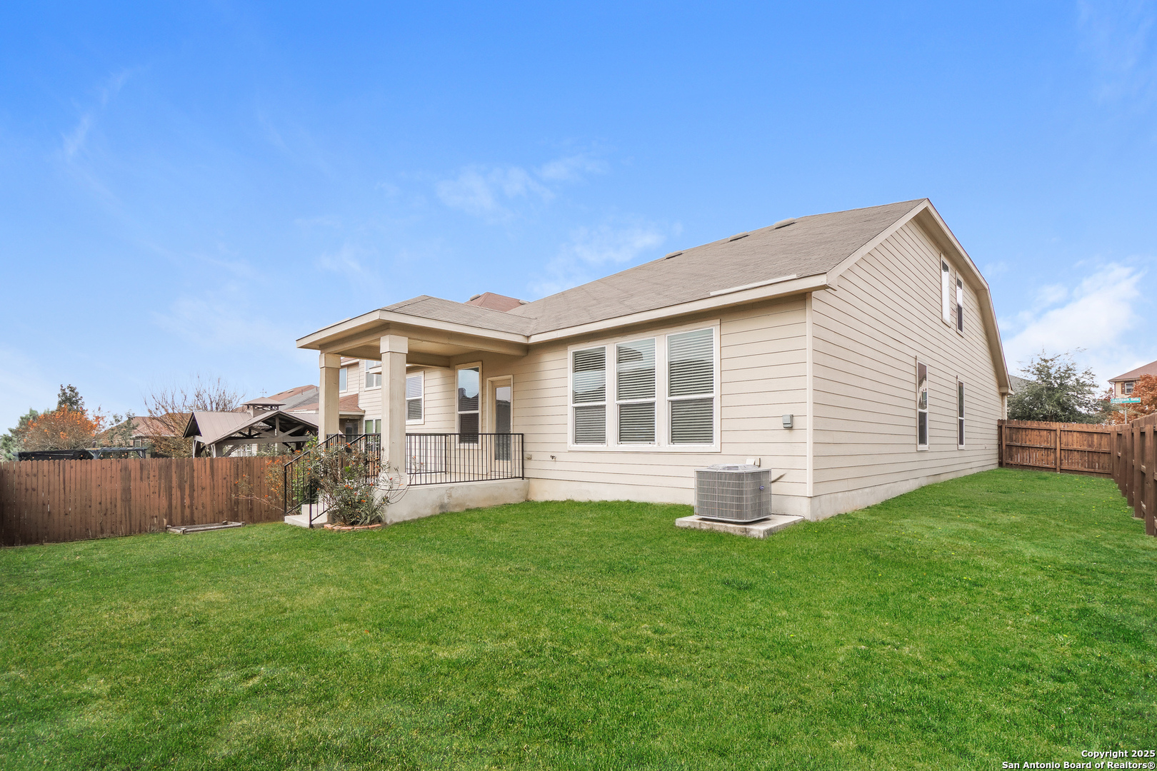 540 Landmark Gate Cibolo, TX 78108 - Photo 20 of 22 a front view of a house with a yard and garage
