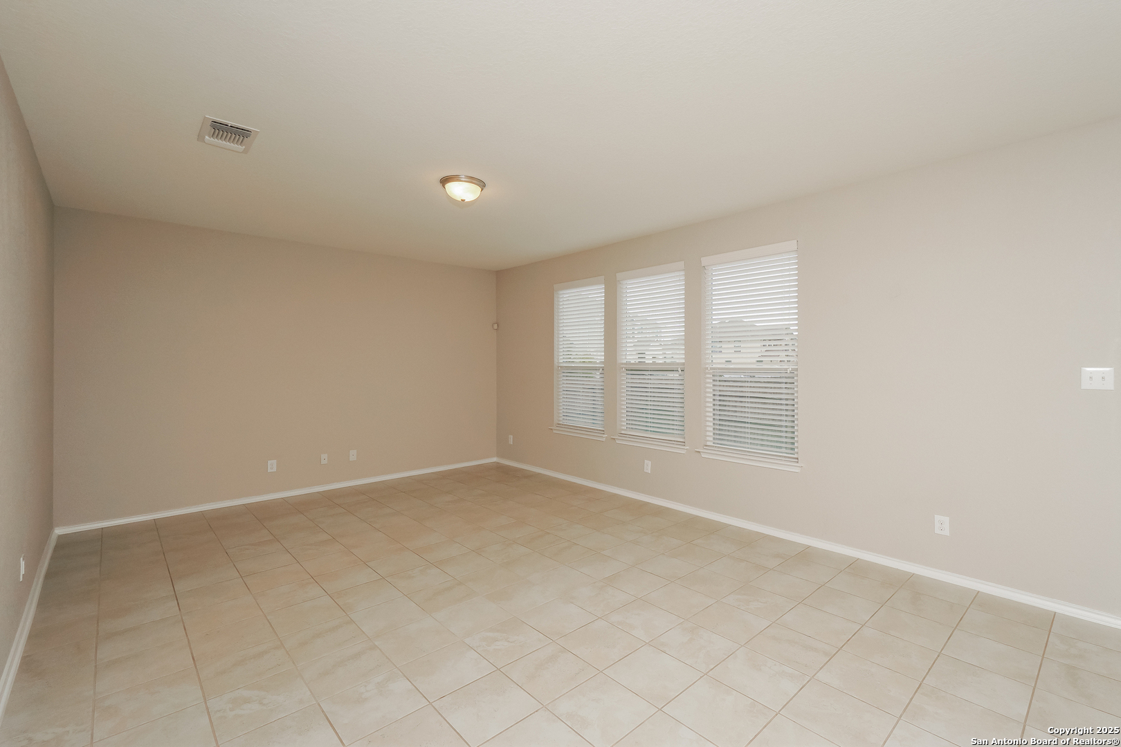 540 Landmark Gate Cibolo, TX 78108 - Photo 3 of 22 an empty room with windows