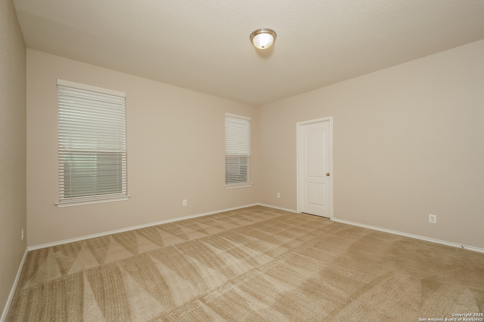 540 Landmark Gate Cibolo, TX 78108 - Photo 8 of 22 an empty room with windows