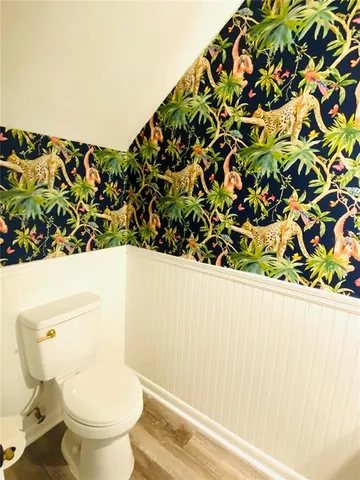 a bathroom with a toilet and a sink