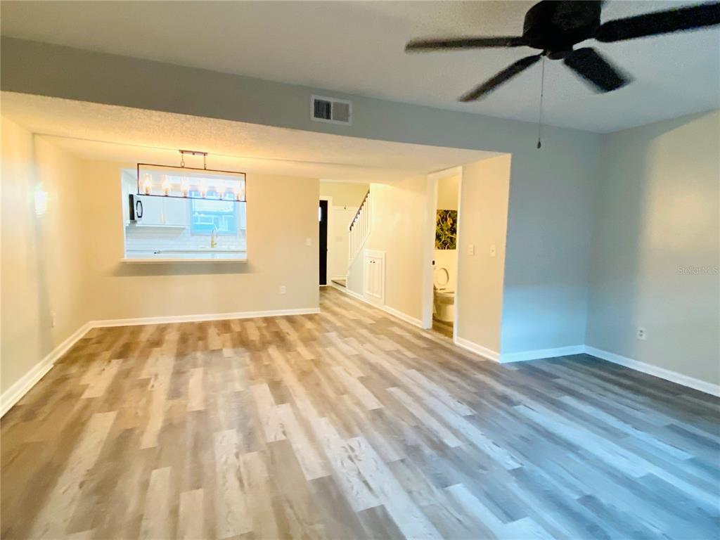 148 Douglas Road West, Unit C Oldsmar, FL 34677 - Photo 13 of 25 a view of an empty room and window