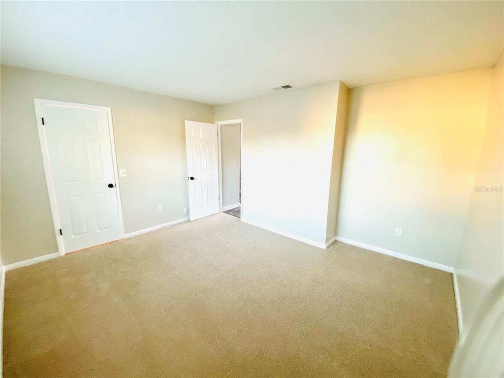 148 Douglas Road West, Unit C Oldsmar, FL 34677 - Photo 22 of 25 a view of empty room
