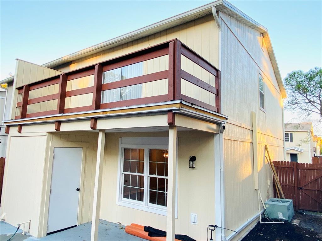 148 Douglas Road West, Unit C Oldsmar, FL 34677 - Photo 25 of 25 a view of a house with a window