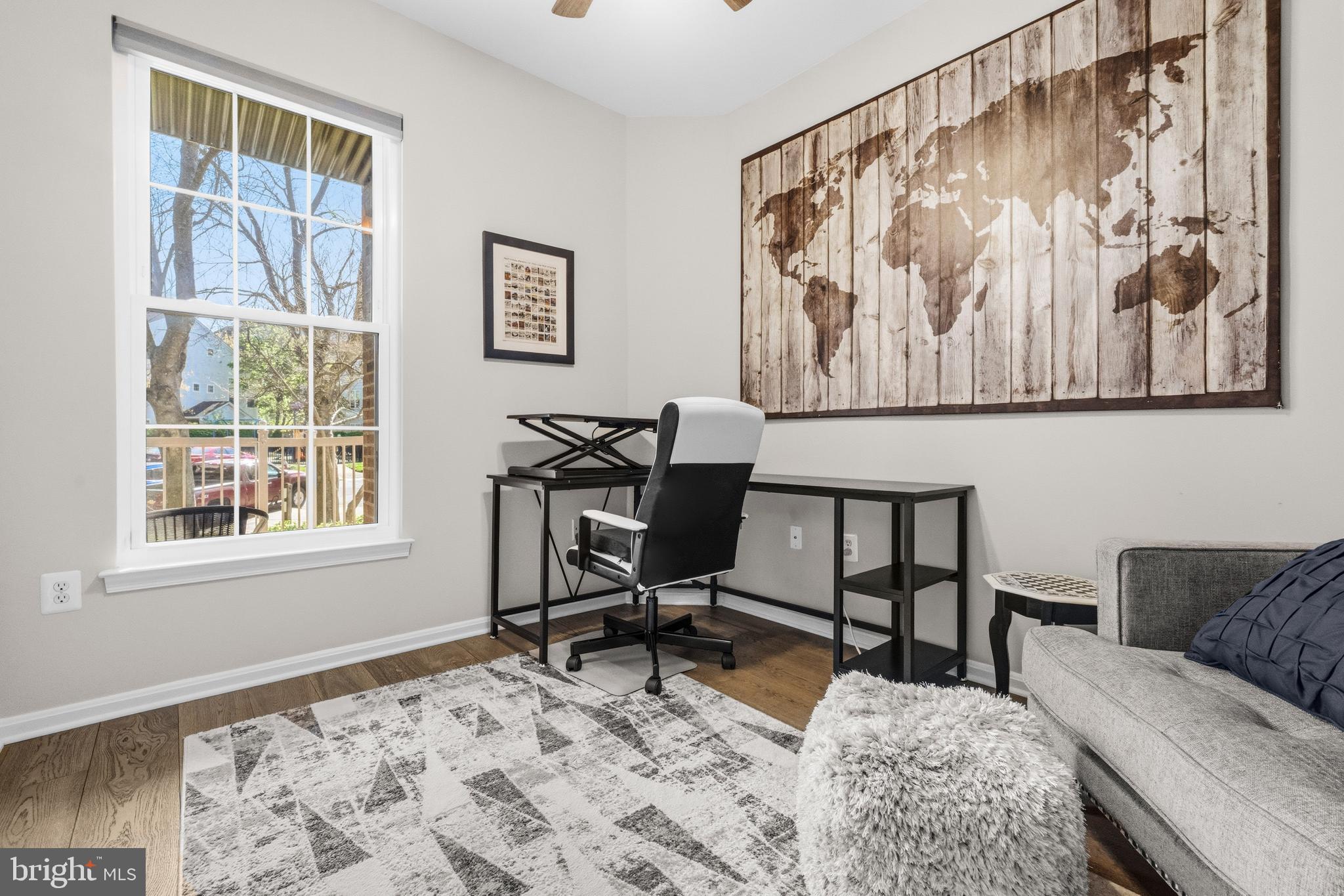 7706 Haynes Point Way, Unit D Alexandria, VA 22315 - Photo 13 of 27 a view of a livingroom with workspace and a window