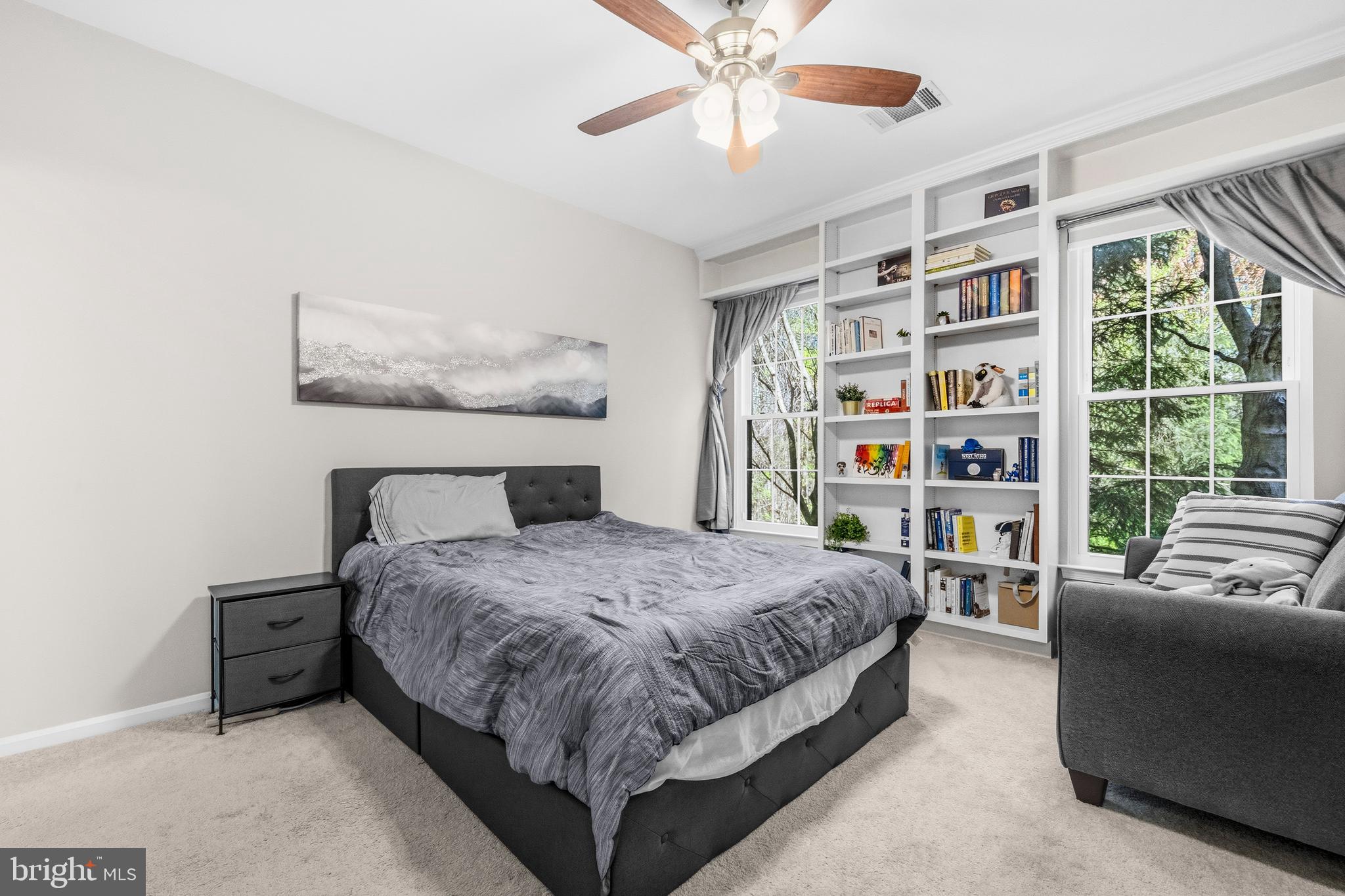 7706 Haynes Point Way, Unit D Alexandria, VA 22315 - Photo 15 of 27 a bedroom with a bed furniture and a large window