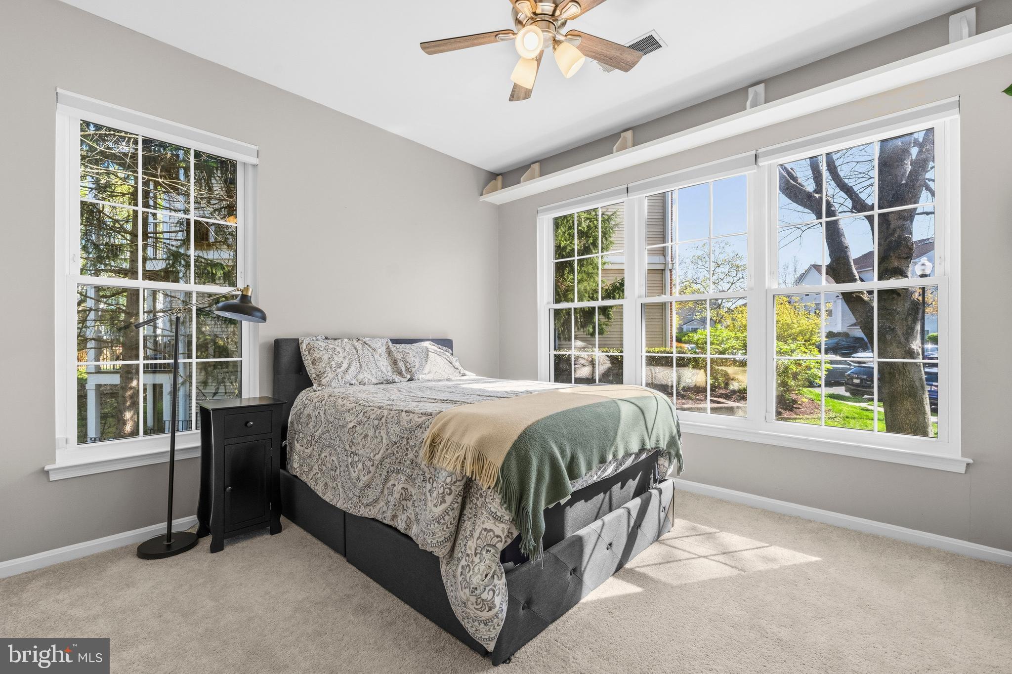 7706 Haynes Point Way, Unit D Alexandria, VA 22315 - Photo 18 of 27 a spacious bedroom with a bed and window