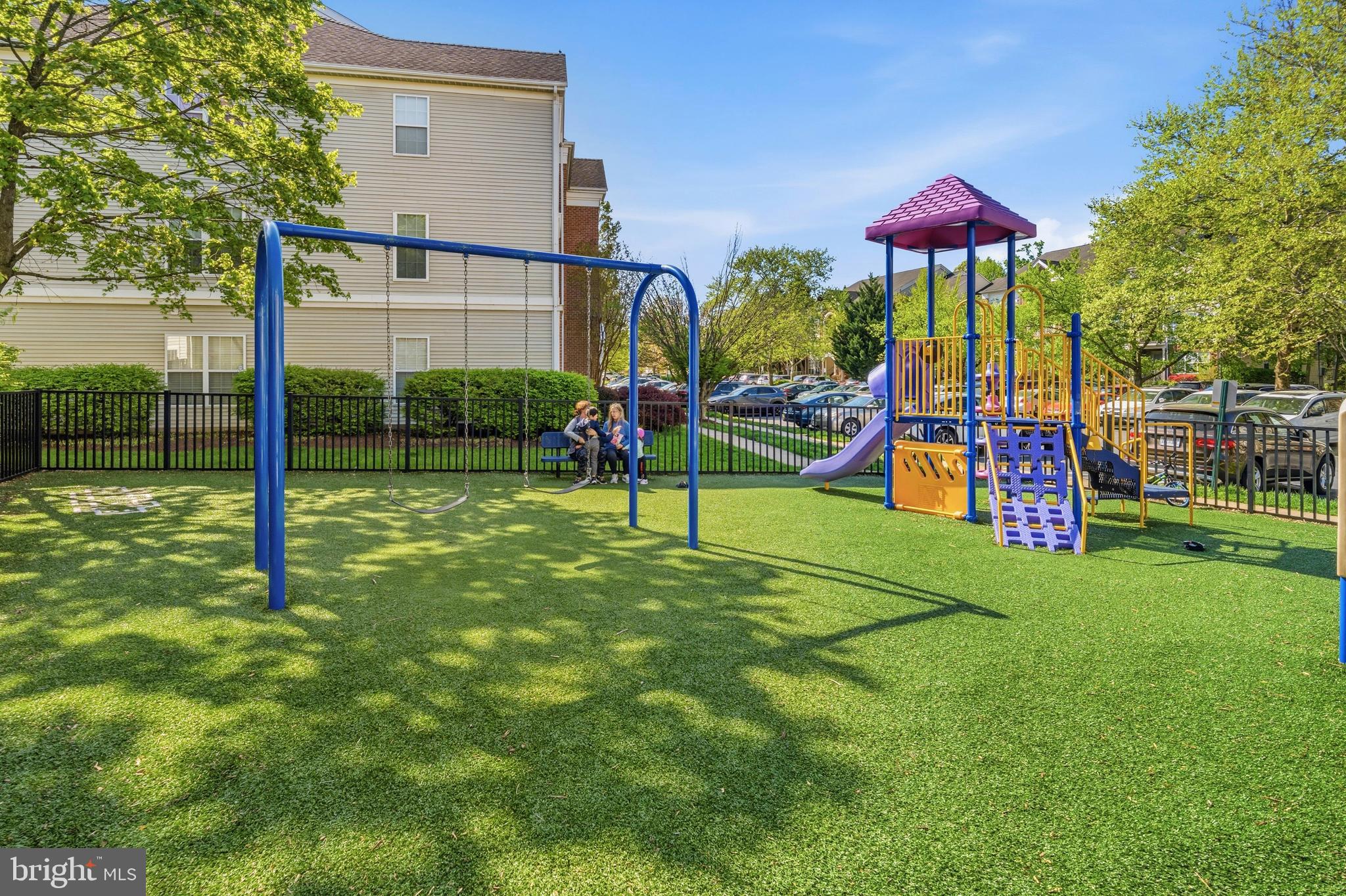 7706 Haynes Point Way, Unit D Alexandria, VA 22315 - Photo 22 of 27 a view of a house with a yard and sitting area