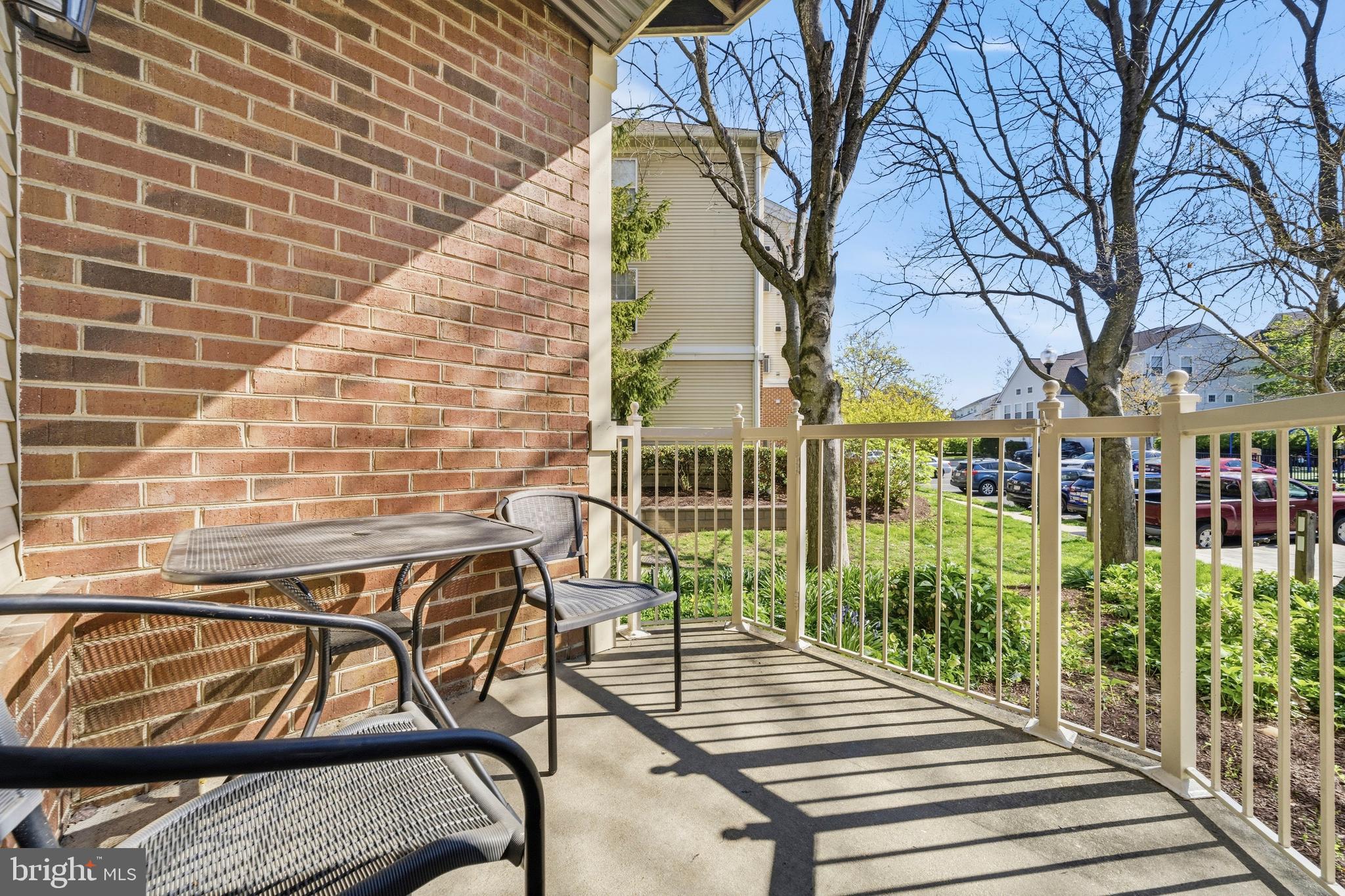 7706 Haynes Point Way, Unit D Alexandria, VA 22315 - Photo 7 of 27 a view of a patio with iron fence