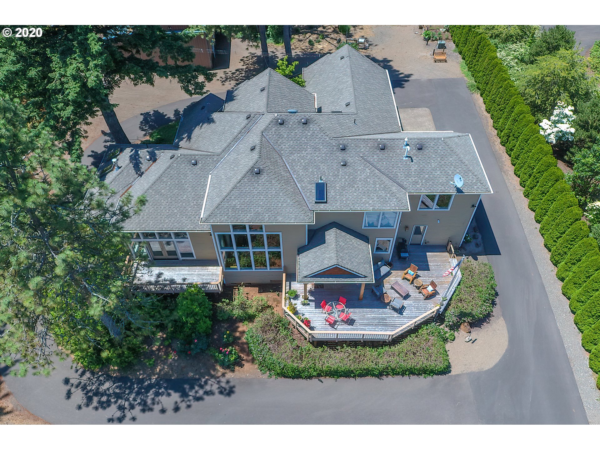 17420 Southwest Parrett Mountain Road Sherwood, OR 97140 - Photo 1 of 32 an aerial view of a house with a swimming pool