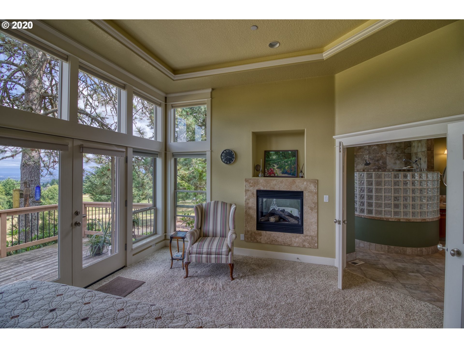 17420 Southwest Parrett Mountain Road Sherwood, OR 97140 - Photo 17 of 32 a living room with furniture and a fireplace