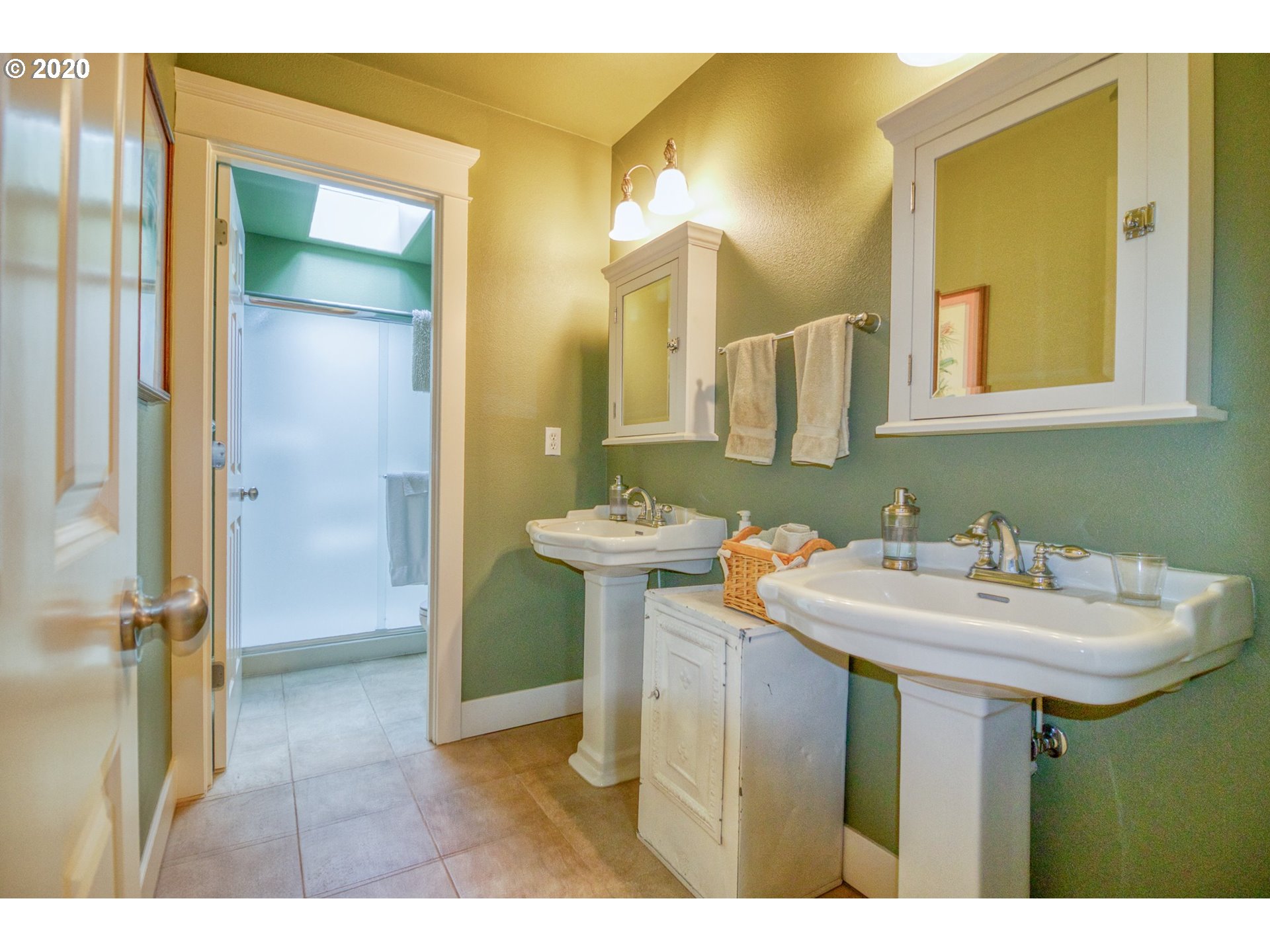 17420 Southwest Parrett Mountain Road Sherwood, OR 97140 - Photo 22 of 32 a bathroom with a sink and a mirror