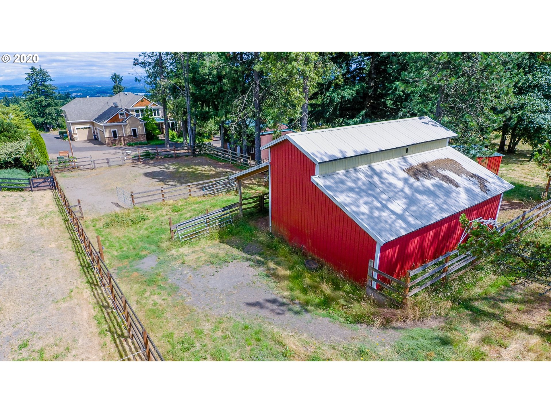 17420 Southwest Parrett Mountain Road Sherwood, OR 97140 - Photo 25 of 32 a view of a backyard with a barn