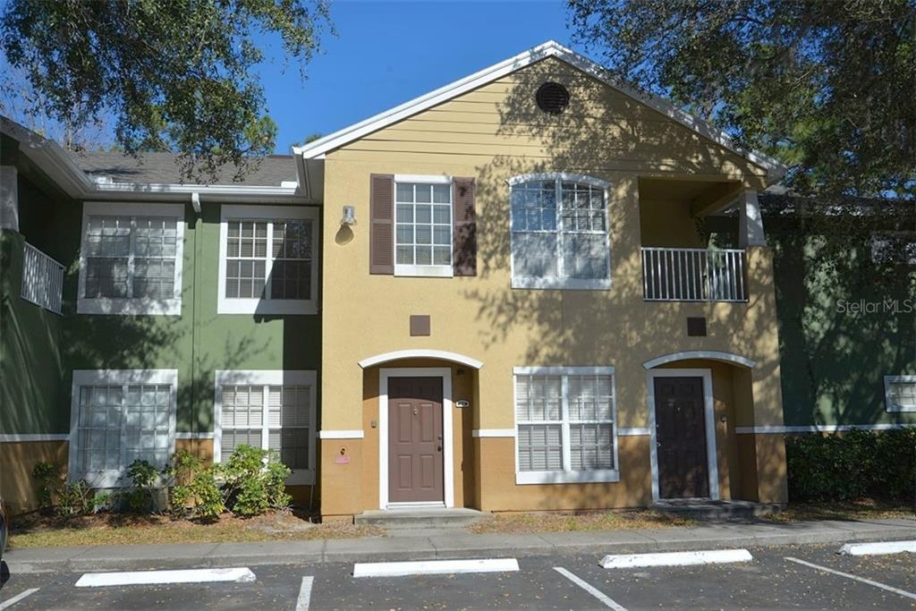 4308 South Kirkman Road, Unit 1710 Orlando, FL 32811 - Photo 1 of 1 a front view of a house