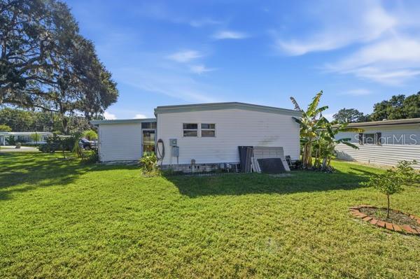 101 Mango Cove Leesburg, FL 34748 - Photo 16 of 28 a house view with a garden space