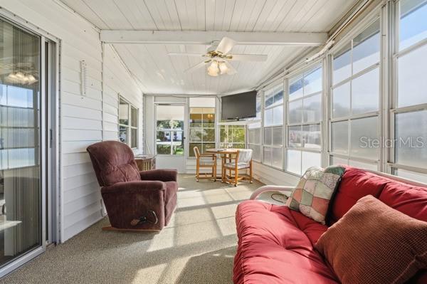 101 Mango Cove Leesburg, FL 34748 - Photo 22 of 28 a living room with furniture and a large window