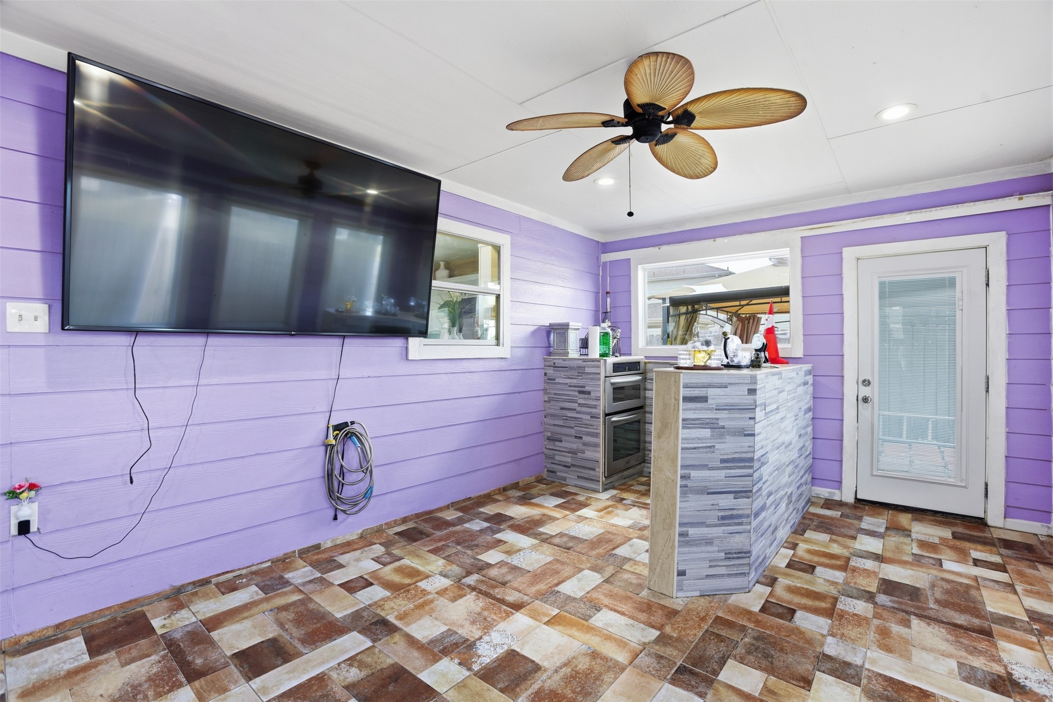 7819 Pasture Spring Lane Cypress, TX 77433 - Photo 12 of 22 a view of a livingroom with closet and a ceiling fan