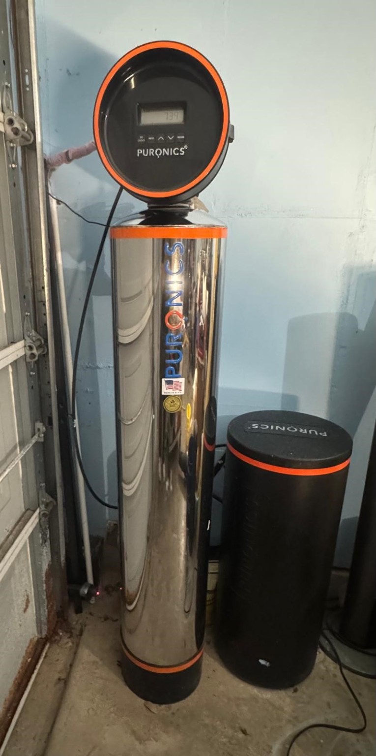 7819 Pasture Spring Lane Cypress, TX 77433 - Photo 20 of 22 a water heater on the wall