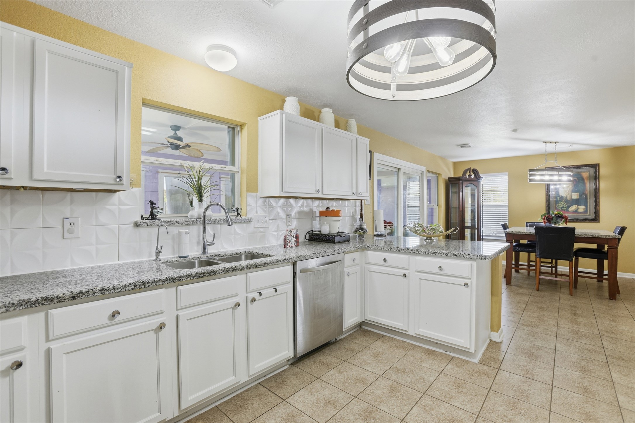 7819 Pasture Spring Lane Cypress, TX 77433 - Photo 4 of 22 a kitchen with a sink and cabinets