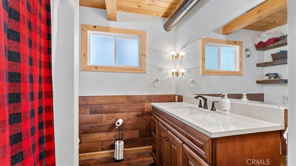 6231 Merry Way Clipper Mills, CA 95930 - Photo 25 of 60 a bathroom with a sink and a mirror