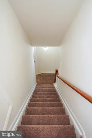 a view of hallway with closet