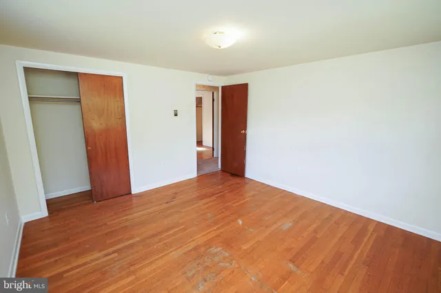 a bathroom with a sink a bathtub and a window