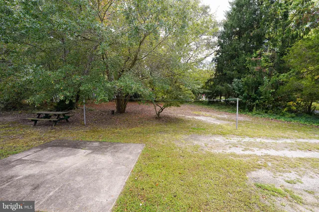 a view of swimming pool with a patio